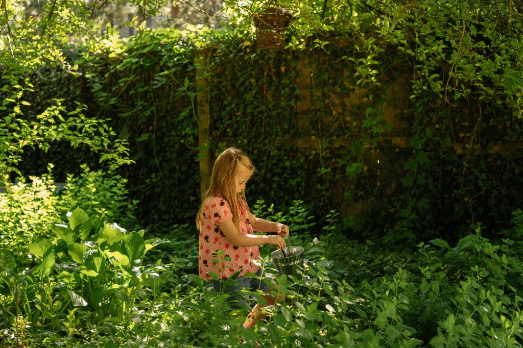 Girl playing in the woods